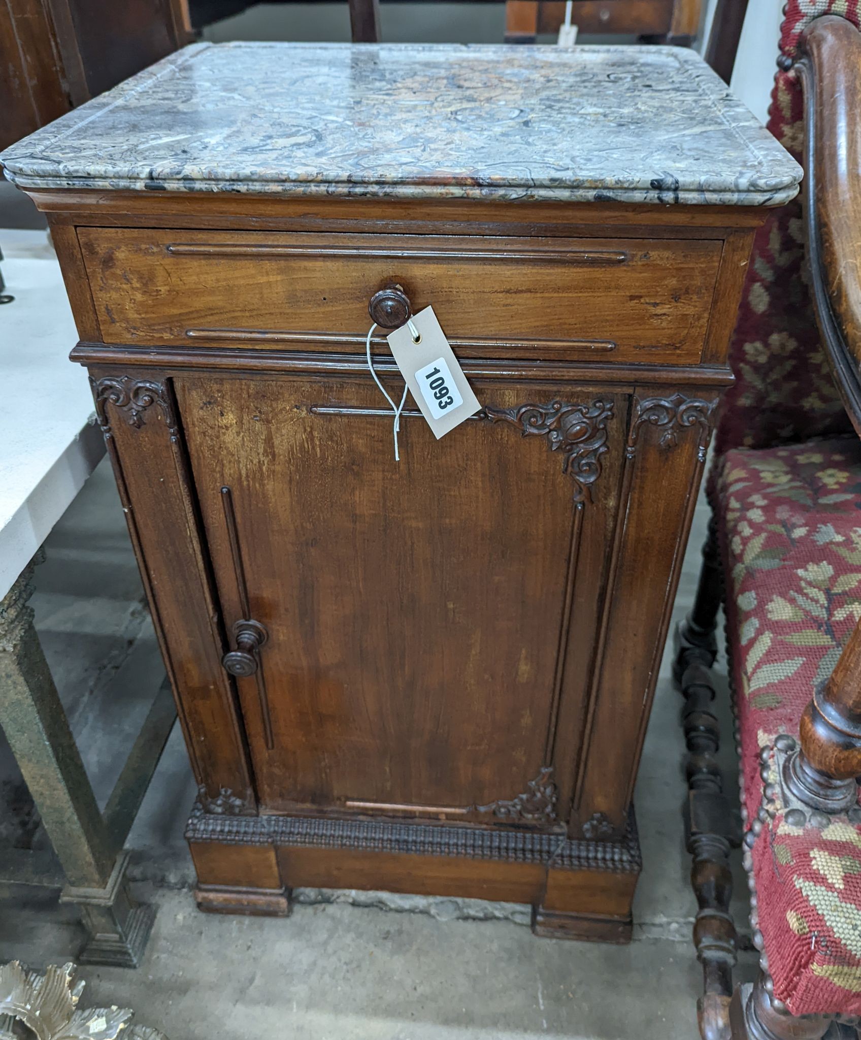 A 19th century fossil stone topped bedside table, width 42cm, depth 38cm, height 75cm